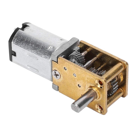 Front view of a small DC gear motor with brass worm-gear gearbox and metal housing; output shaft visible.