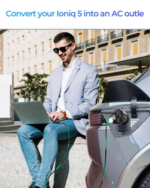 Road Tripping Got You Covered V2L Adapter Compatible With Hyundai Ioniq 5 And Ioniq 6 Plus Kia EV6 connected for laptop use.