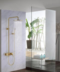 Wall Mounted Exposed Shower System Brushed Gold 3 in 1 with rainfall head and handheld sprayer in a modern bathroom.