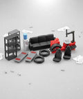 Top Shelf Miniature Vehicle Repair Shop Scene Featuring Resin Seats And Tire Balancing Machine For Collectible Scale Dioramas And Knockout Model Garage Displays, 1:64 scale resin pieces including a sofa, tire machine, and shelves.