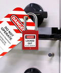 All In One Lockout Tagout Kit With Electrical LOTO Hasps Warning Tags Numbered Safety Padlocks Nylon Ties Zip Ties And Heavy Duty Storage Bag For Quick Safe Lockout Procedures On Any Job Site showing red padlock and warning tag on iron latch