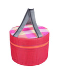 Portable round insulated picnic basket with zipper, featuring a red and pink plaid pattern and gray carrying straps.