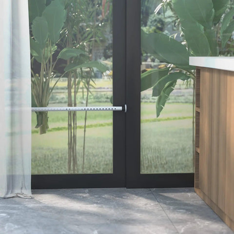 Two Pack Sliding Glass Door Security Bar Adjustable White Extends 27 To 43 Inches installed on glass door