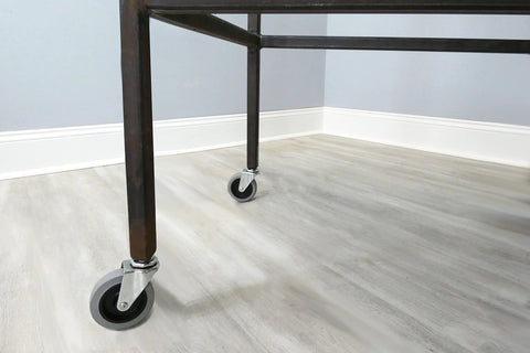 3-Inch Swivel Stem Caster With Non-Marking TPR Rubber Wheel on furniture leg, installed view in room