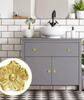 Kickstart Your Home Refresh With Vintage Gold Flower Cabinet Knobs And Brass Drawer Pulls An Eight Piece Hardware Set delivering style to a gray dresser.