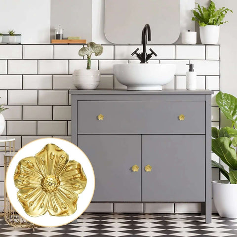 Kickstart Your Home Refresh With Vintage Gold Flower Cabinet Knobs And Brass Drawer Pulls An Eight Piece Hardware Set delivering style to a gray dresser.
