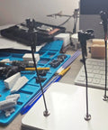 VBESTLIFE Helping Hands Soldering Station Kit With Magnet Base And 12 Flexible Alligator Clips For Electronics Repair PCB Work And Airbrushing Projects set up on a workbench.