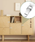 Stainless Steel Spring Loaded Toggle Latch Set Four Pack With Screws Heavy Duty Metal Locking Latch on cabinet door.