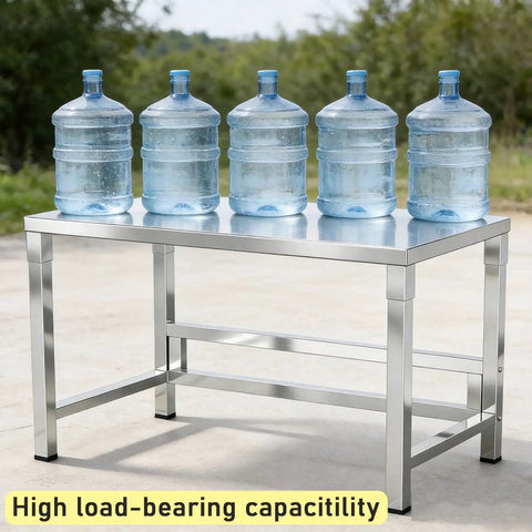 Heavy Duty Stainless Steel Workbench With Beefy Reinforced Crossbars And Folded Safety Edges For Rock Solid Kitchen Prep Or Warehouse Packing Projects with water bottles on top.
