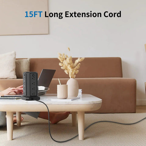 Ultimate Surge Protector Power Strip Tower with 16 outlets and 4 USB ports, 15 ft cord, shown on coffee table in home office.