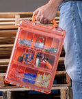 Person holding the MODBOX Replacement Bins Four Pack Rectangle and Square Bins for Small Parts Storage with Dividers in a toolbox.