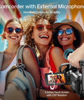 People recording with 8K Ultra HD Video Camera Camcorder For YouTube Vloggers with 88MP stills, WiFi, 18x zoom, and microphone.