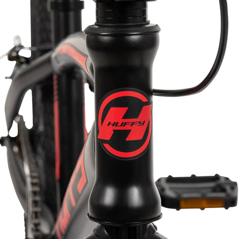 Close-up of the Axilus Kids BMX Bike For Intermediate Riders With 20 Inch Wheels, showing sturdy steel frame and Huffy logo.