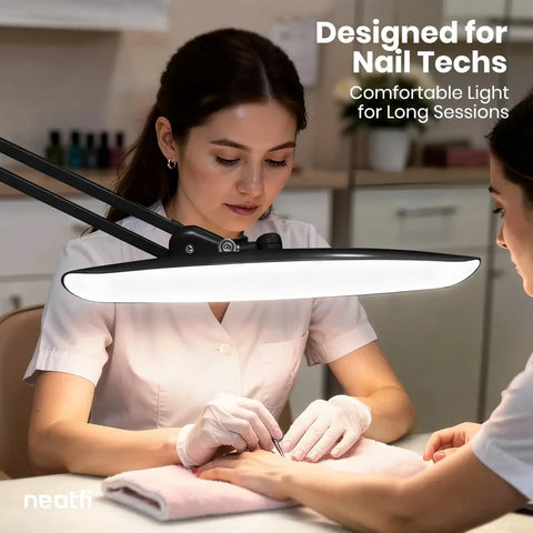 Mega Bright 2200 Lumens LED Desk Lamp with 24W power illuminating nail tech workspace, adjustable arm, black.
