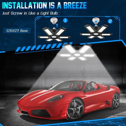 Red sports car under Eight Pack 200W LED Garage Lights With Six Adjustable Panels 20000 Lumen 6500K Daylight Folding Ceiling Shop Lights