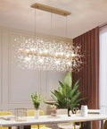 12-Light Crystal Firework Chandelier With Gold Metal Finish above dining table