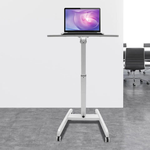 Heavy Duty Rolling Upright Desk With Adjustable Height Gas Lift And Secure Tilting Top Tray For Your Smooth Operator Home Office Or Classroom Workspace, with laptop on top, white frame