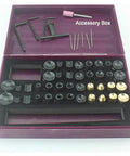 Compact 7-Speed Electric Drill Press For Jewelry Making With Adjustable Bench Stand Clamp And Brass Chuck Set For Drilling Ivory Pearls Crystals Jade Agate Amber Crafts Professional Precision Tool accessory box displaying various drill bits and clamps.
