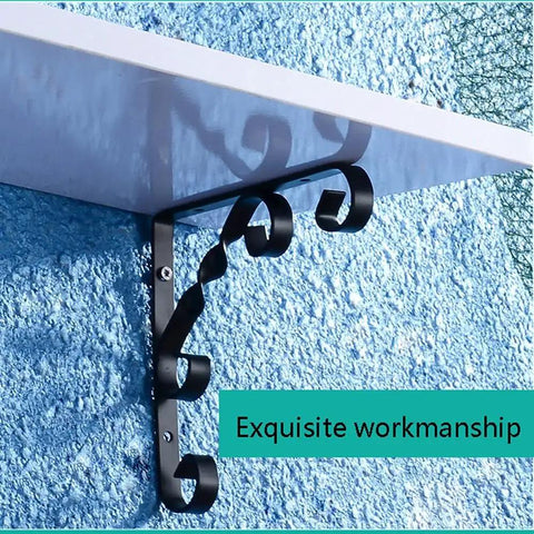 Built Like A Tank Wrought Iron Shelf Brackets Wall Mount Corner Support For Bookcases Kitchen Cabinets And Outdoor Storage on a blue wall.