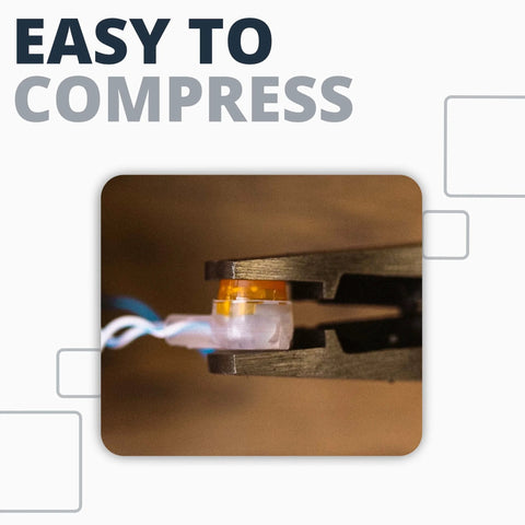 Presslok splice connector in orange/clear insulation being crimped in a crimp tool jaws