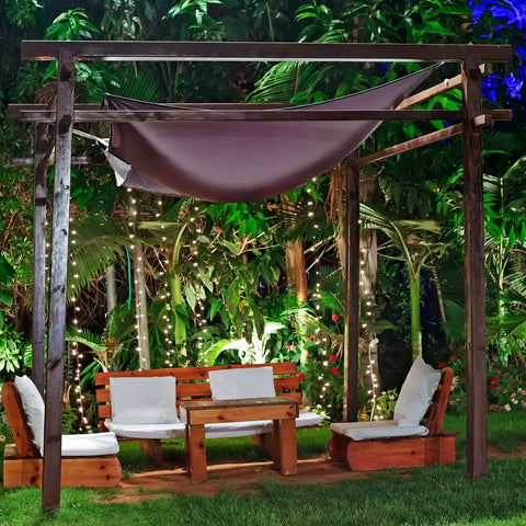 Outdoor pergola decorated with clear mini Christmas string lights on brown wire cord for a cozy festive vibe.