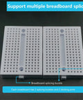 Six Pack Mini Breadboard Kit White With 170 Tie Points No Soldering Needed shown with splicing buckles on black background.
