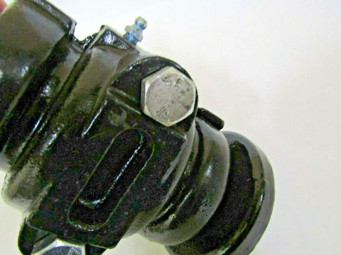 Close-up of Disc Harrow Bearing Assembly With One Inch Square Shaft showing 7.5 inch ribbed spool caps bolt for heavy duty farm use.