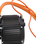 Close-up of Beast 10KW Mid Drive Electric Bike Motor PMSM with Hall Sensor IP67, showing orange power cables and connectors.