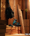 18V LXT Cordless Framing Nailer With 21 Degree Full Round Head, 3-1/2 Inch, Tool Only on lumber stack in wooden workshop