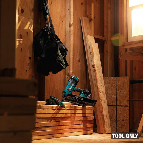 18V LXT Cordless Framing Nailer With 21 Degree Full Round Head, 3-1/2 Inch, Tool Only on lumber stack in wooden workshop