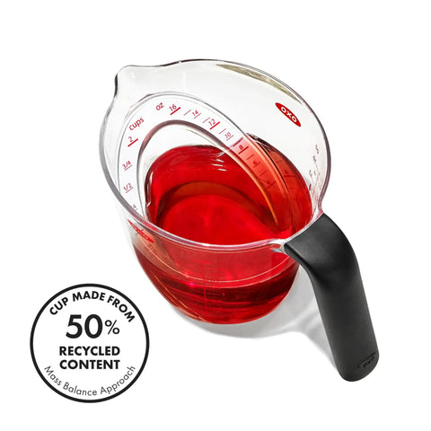 Angled 2 Cup Measuring Cup With Easy Read From Above Measurements filled with red liquid, BPA Free Tritan Renew, soft non-slip handle