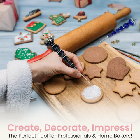 Hand using Red Crystal Rhinestone Cake Decorating Scriber Tool Sugar Craft Poking Needle for fondant on cookie designs.