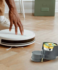Must-Have Side Brush Motor Replacement For iRobot Roomba 500 600 700 800 900 Series Grey displayed near a vacuum