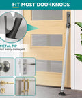 2-In-1 Sliding Door Security Bar and Window Guard, Adjustable 16.5 to 48 Inches installed against a wooden door with metal tip.