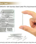 120 Piece Cotter Pins Assortment Kit 304 Stainless Steel 6 Sizes M1.6x25 M2.5x25 M2.5x40 M3.2x30 M3.2x40 M4x60 Durable For DIY Automotive Equipment Kindroufly displayed in a box and one held by hand.