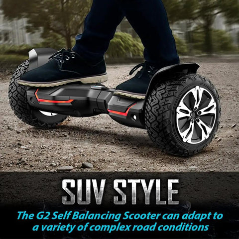 Person riding Warrior 8.5 Inch All Terrain Off Road Scooter With Bluetooth Speakers And Led Lights Self Balancing for kids and adults