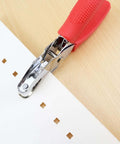 Square Hole Paper Punch 3 Sixteenth Inch Handheld Puncher with Red Soft Grip Handle in use on paper, creating square holes
