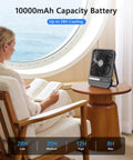 Woman reading near 7 Inch Portable Desk Fan With 10000mAh Battery USB Rechargeable LED Light Display And Timer 4 Speed Settings.