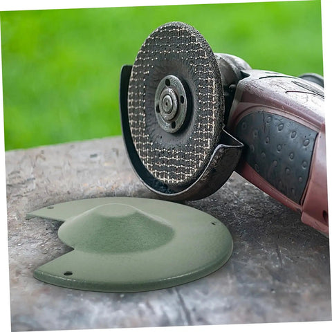 Angle Grinder Wheel Guard Protector Easy Install Safety Shield on a workbench with green iron cover next to grinder machine.