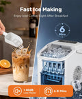 No-Hassle Portable Countertop Ice Maker With Scoop And Carry Handle, Fast Six Minute Freeze, Up To Twenty-Six Pounds Daily Output, Two Cube Sizes For Kitchens, Offices Or Chill Weekend Hangouts with ice being scooped into a glass.