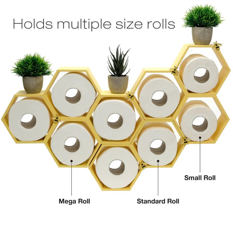 Yellow honeycomb toilet paper holder with bees, holds nine rolls in multiple configurations, shown wall-mounted with plants.