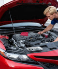 Mechanic working under car hood in garage using 10 Piece Magnetic Tray Set For Tools And Tiny Parts, Stainless Steel Trays.