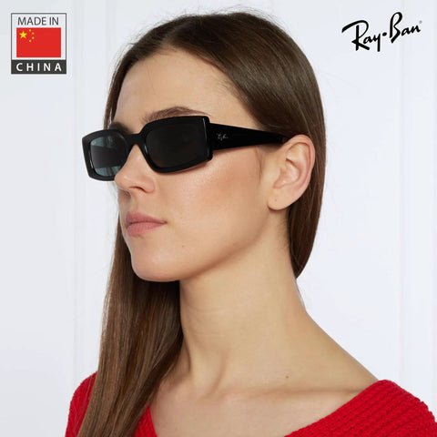 Profile view of woman wearing RB4395 Square Round Shape Non Polarized Sunglasses With Dark Grey Lenses For Men And Women