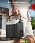 Grab And Go Countertop Nugget Ice Maker Churning Crisp Sonic Pellet Chips Up To Forty Pounds Daily, Four Minute Rapid Freeze, Sturdy Carry Handle shown in use outdoors.