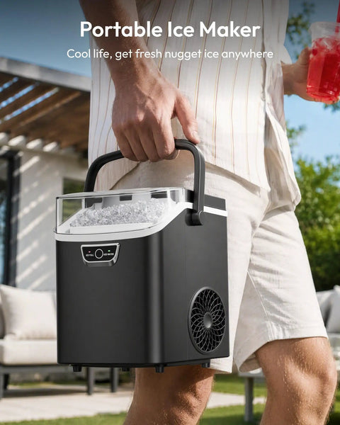 Grab And Go Countertop Nugget Ice Maker Churning Crisp Sonic Pellet Chips Up To Forty Pounds Daily, Four Minute Rapid Freeze, Sturdy Carry Handle shown in use outdoors.