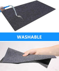 Under Refrigerator Mat With Quick Absorbency Waterproof Non Slip Backing Washable 36 By 36 Inches being tested for absorbency