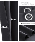 Close-up of Dark Gray Blackout Curtains for Bedroom and Living Room Two Panels 40 By 63 Inches with silver grommets and folds.