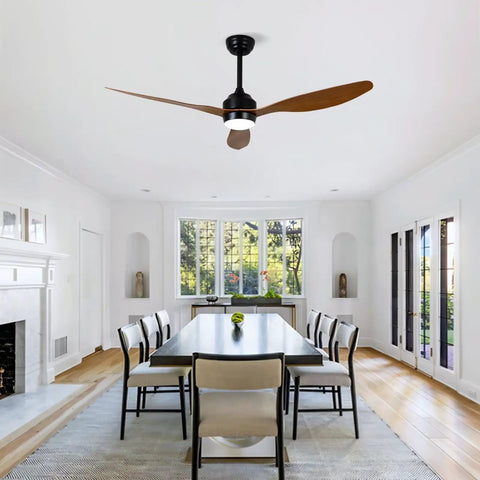 Modern 52 Inch Reversible Ceiling Fan with LED Light, 3 Walnut ABS Blades in bright dining room.
