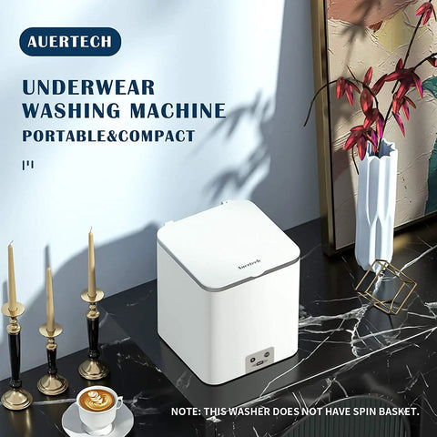 Portable Ultrasonic Washing Machine Mini Underwear Washer Compact Laundry Device on marble surface
