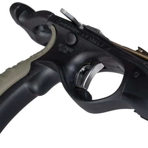 Close-up of stainless steel release system on metal speargun for spearfishing and underwater hunting with anodized aluminum barrel